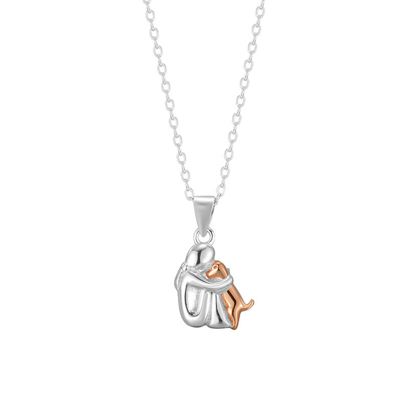 silver necklace, little girl and dog