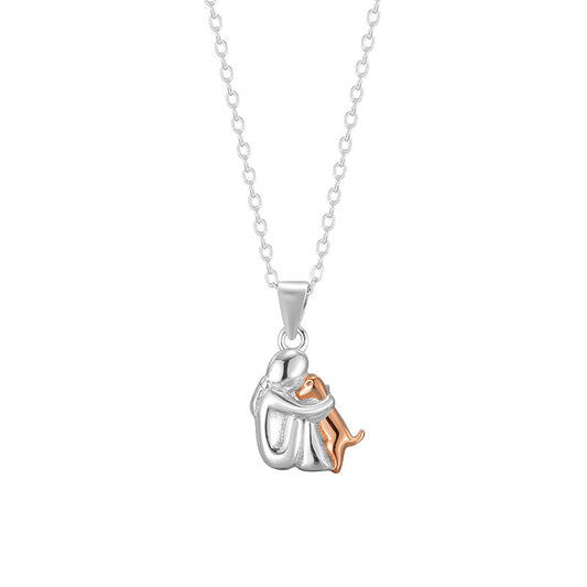 silver necklace, little girl and dog